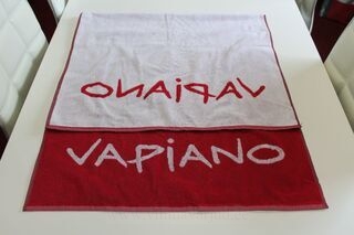 Towel with woevn logo Vapiano
